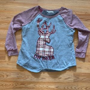 Maurice’s sweater.